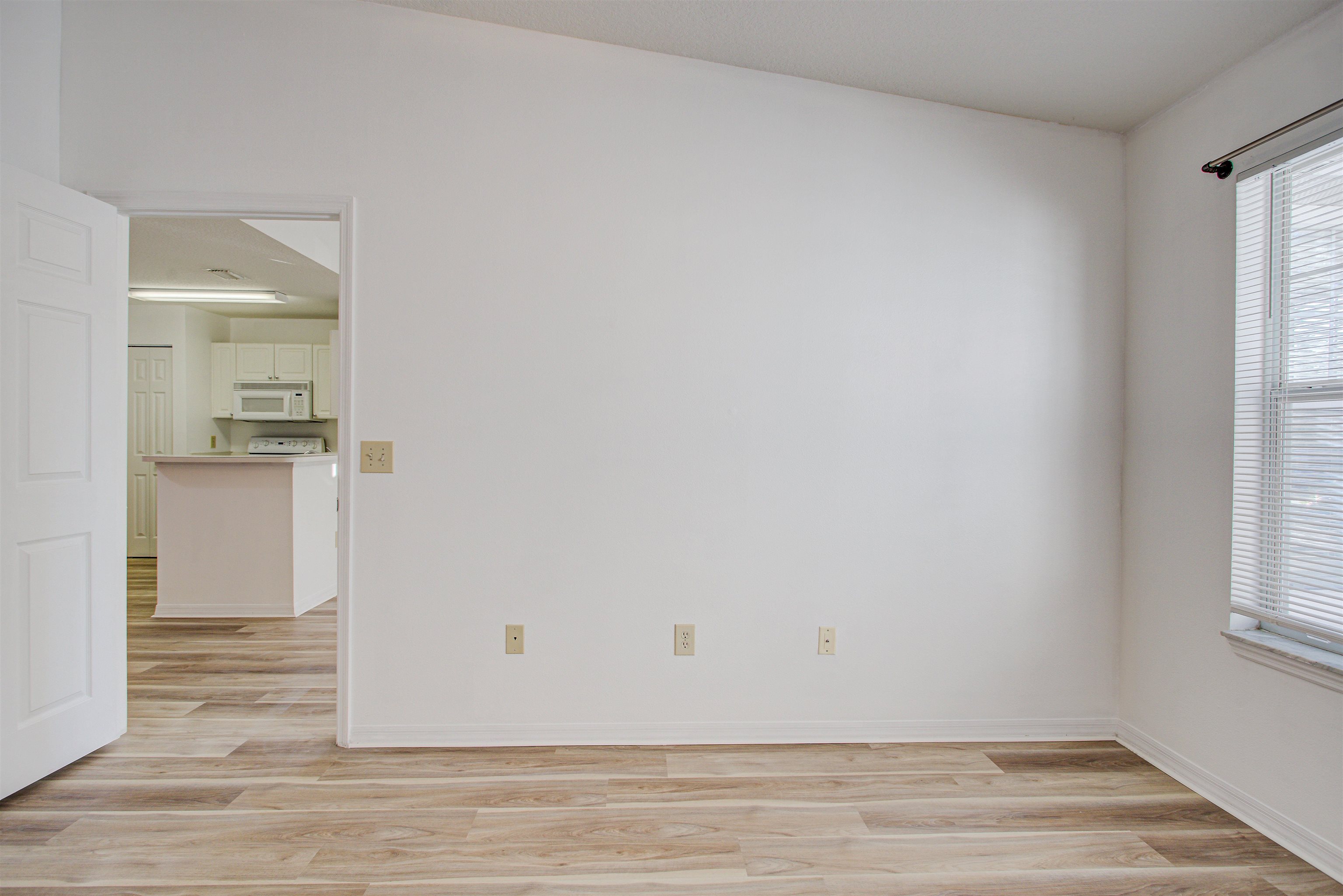 15205 Harbour Vista Circle St. Augustine, FL 32080 - Photo 16 of 20 a view of livingroom with hardwood floor and window