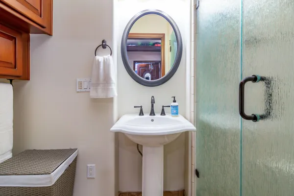 a bathroom with a sink and a mirror
