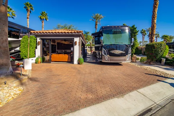 a view of a chairs and tables in the patio