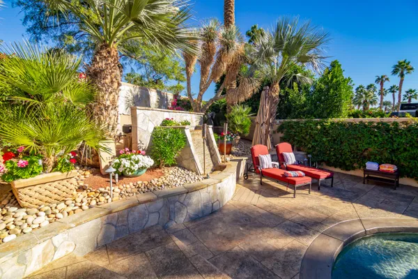 a view of a house with a swimming pool