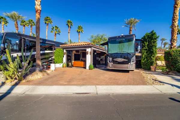 a view of a house with outdoor space and a garage