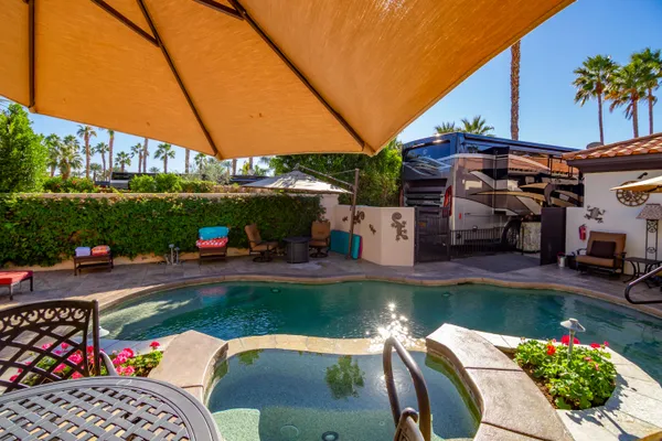 an outdoor space with patio furniture