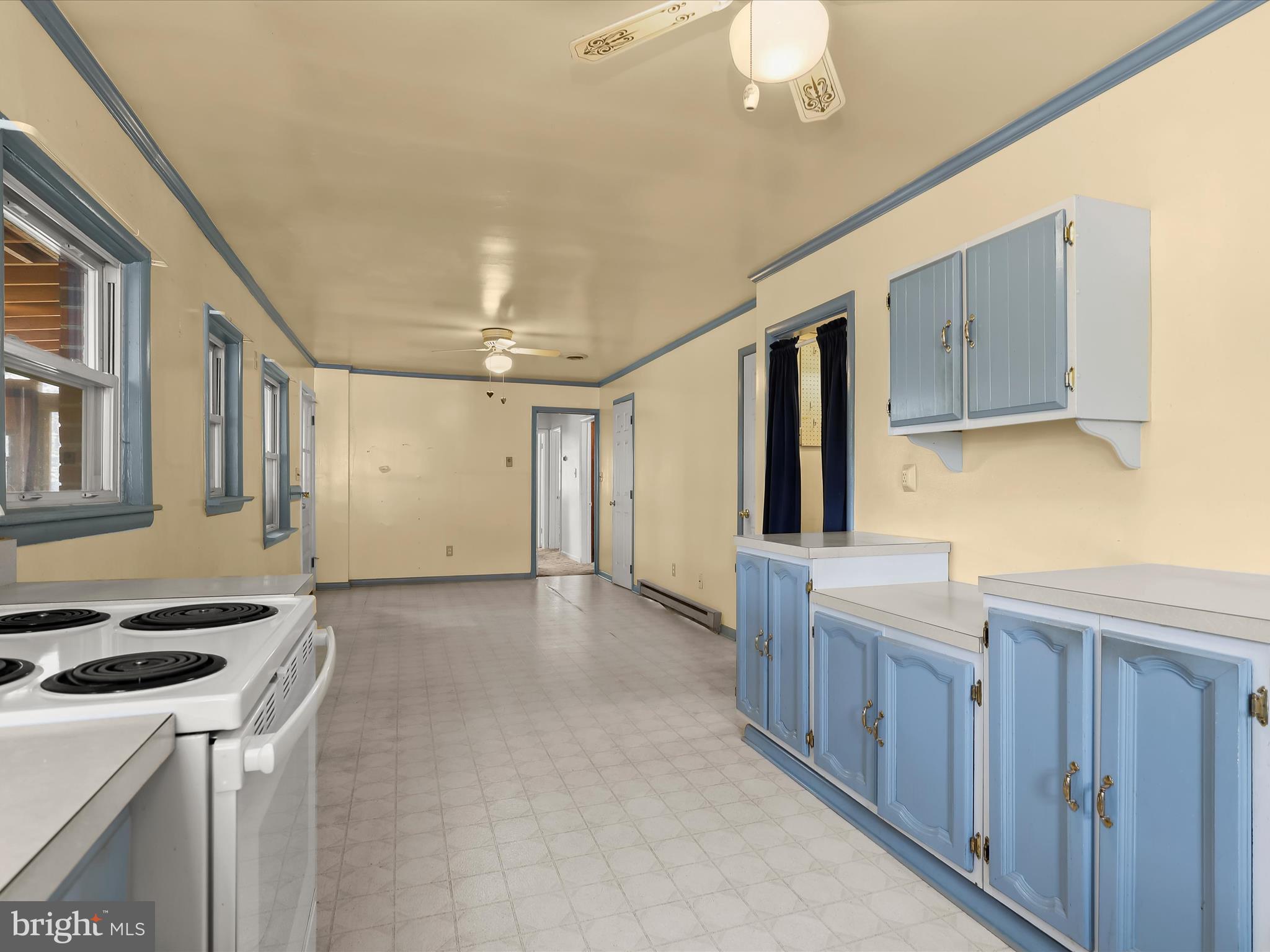 9151 Riverhill Road Laurel, MD 20723 - Photo 11 of 41 a view of a kitchen with electric appliances