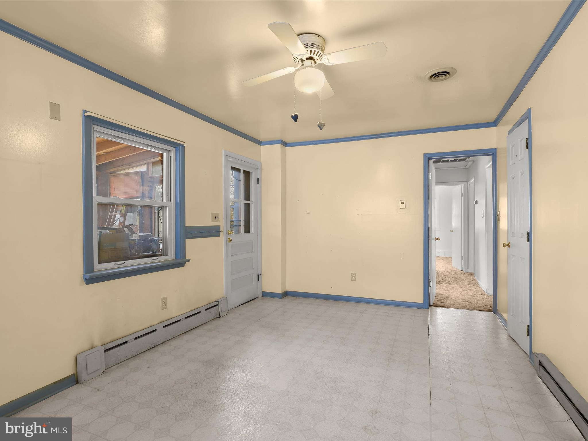 9151 Riverhill Road Laurel, MD 20723 - Photo 12 of 41 a view of an empty room with a window