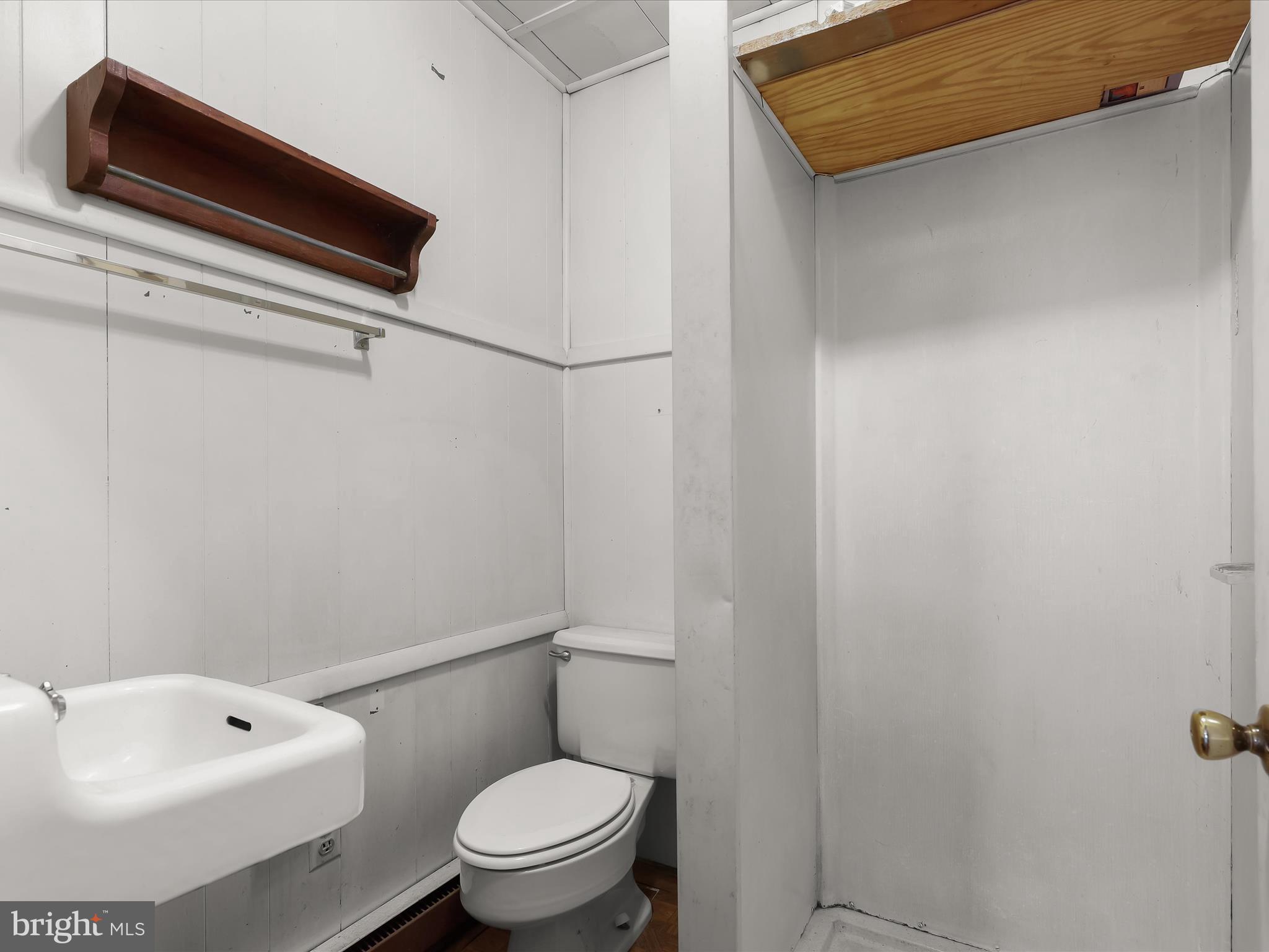 9151 Riverhill Road Laurel, MD 20723 - Photo 28 of 41 a bathroom with a sink and a toilet