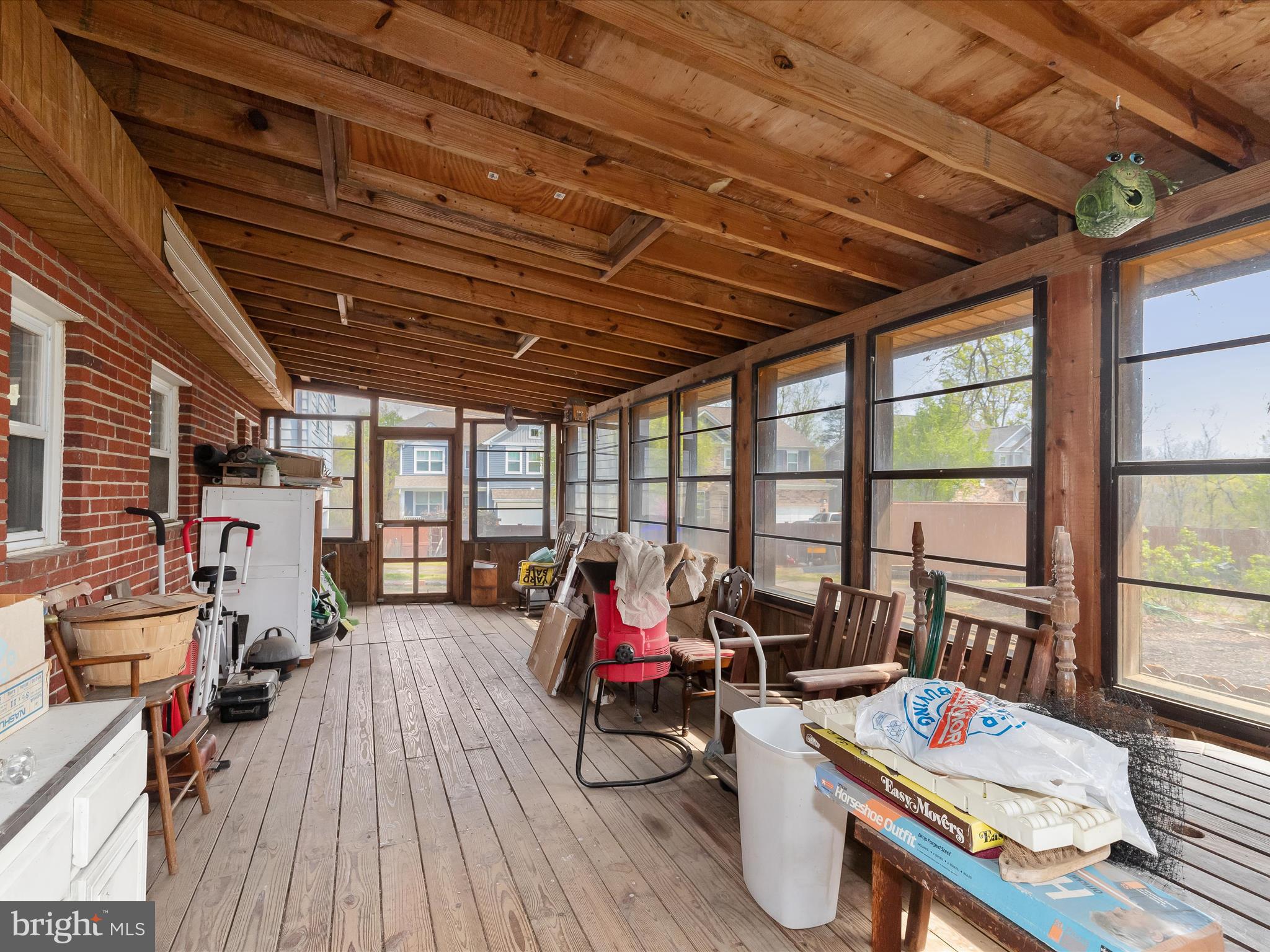 9151 Riverhill Road Laurel, MD 20723 - Photo 29 of 41 a living room with furniture and a wooden floor