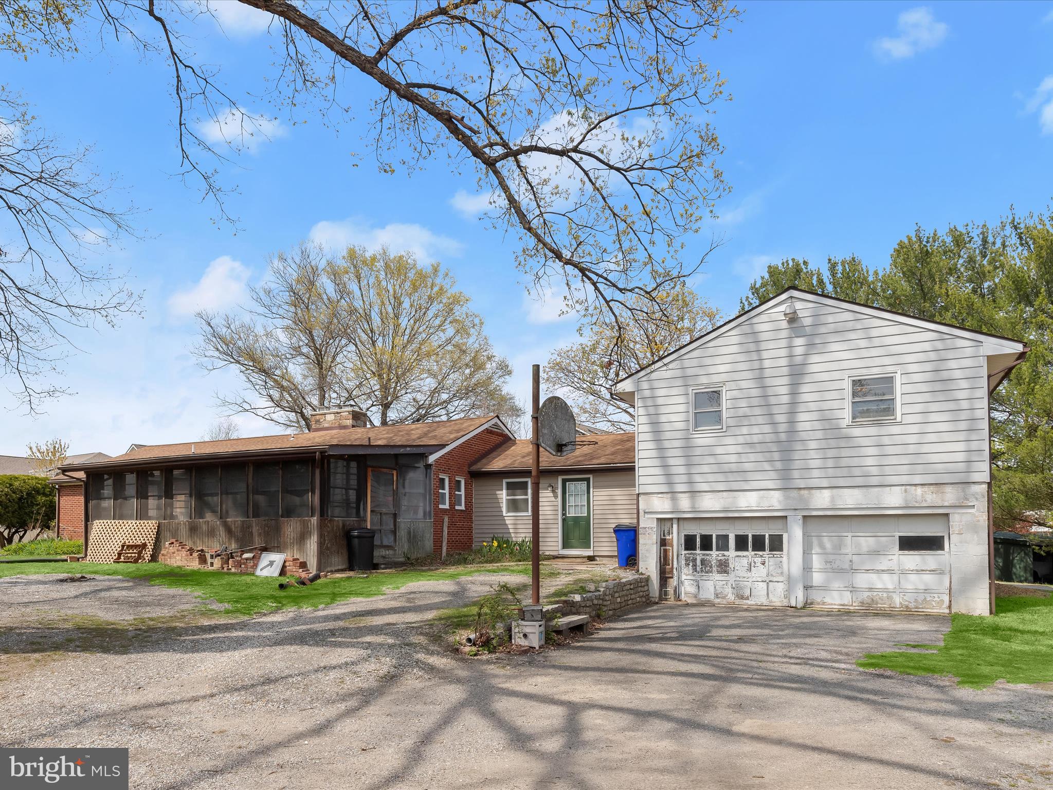9151 Riverhill Road Laurel, MD 20723 - Photo 31 of 41 a front view of a house with a garden
