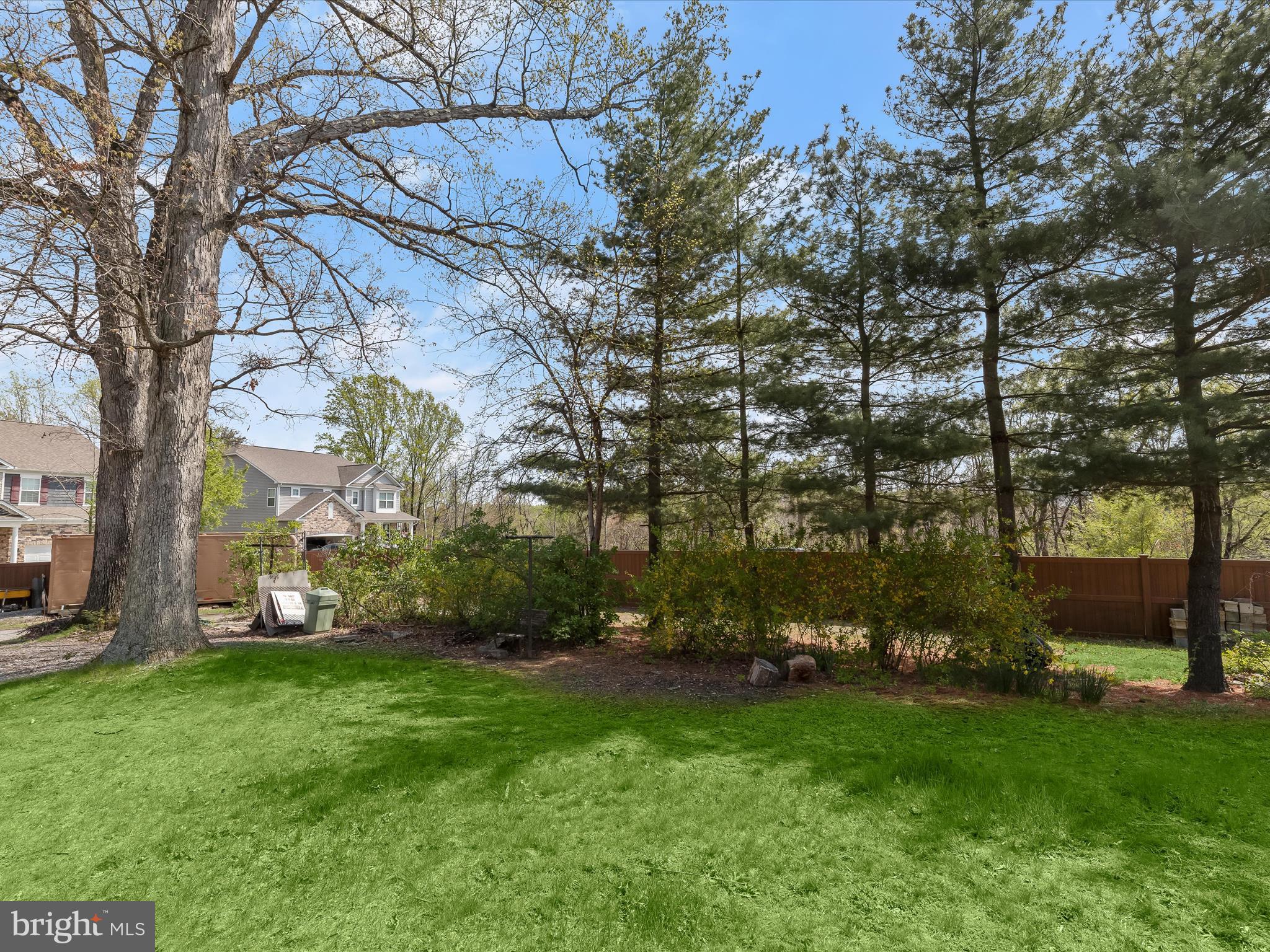 9151 Riverhill Road Laurel, MD 20723 - Photo 33 of 41 a view of a backyard with large trees