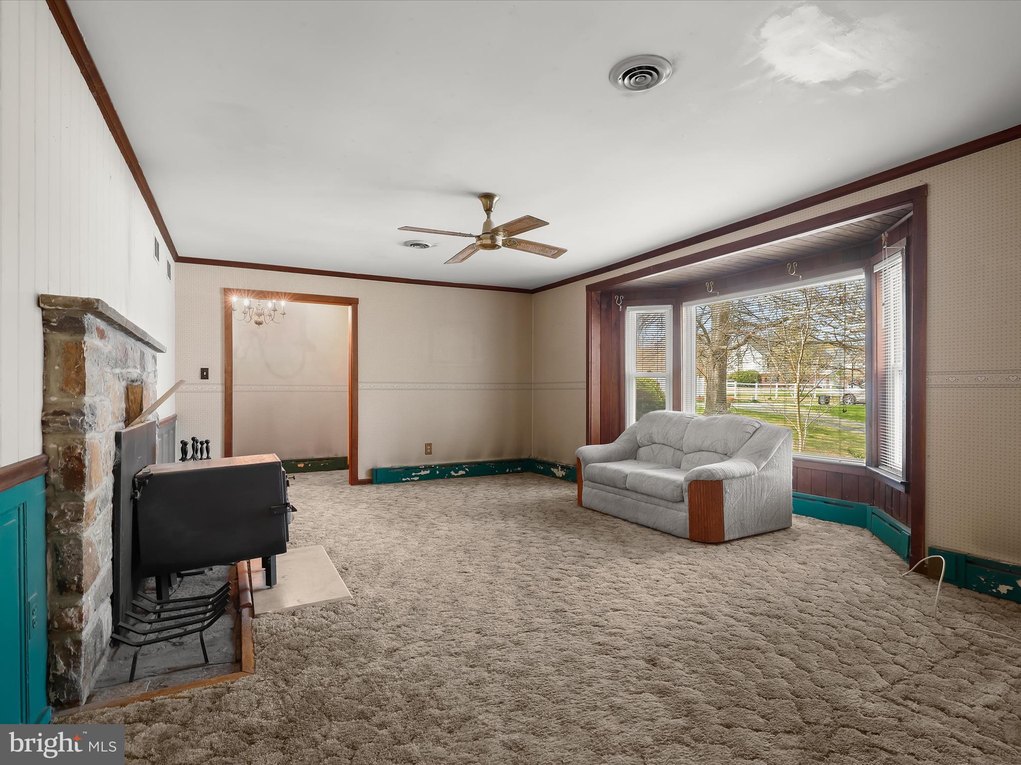 9151 Riverhill Road Laurel, MD 20723 - Photo 8 of 41 a view of a livingroom with furniture and windows
