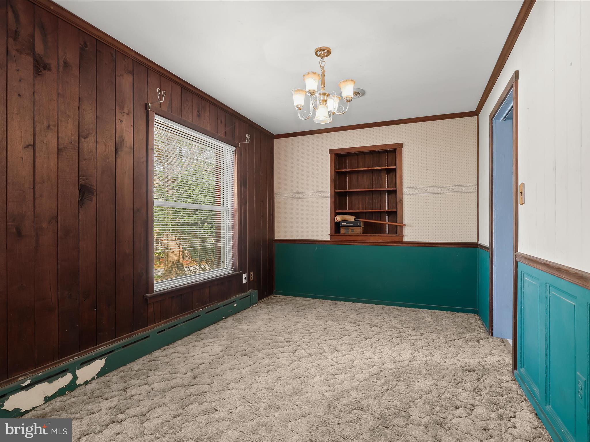 9151 Riverhill Road Laurel, MD 20723 - Photo 9 of 41 a view of a room that has a window and a chandelier