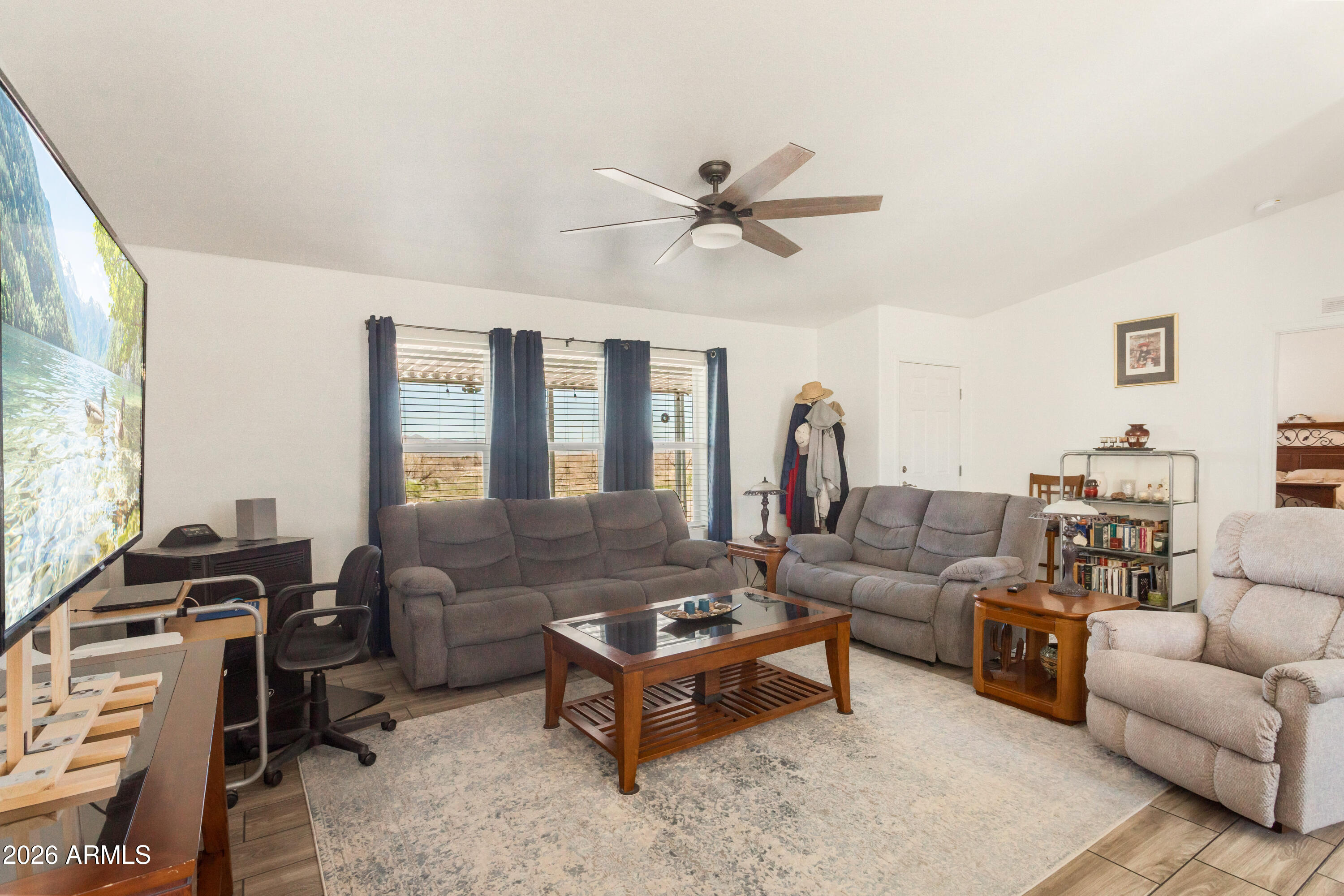 3191 West Williams Road Benson, AZ 85602 - Photo 12 of 46 a living room with furniture