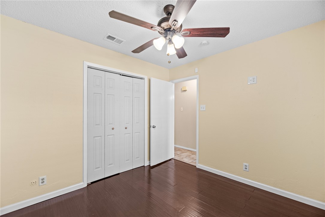 1910 Cherokee Street Corpus Christi, TX 78409 - Photo 17 of 23 wooden floor in an empty room