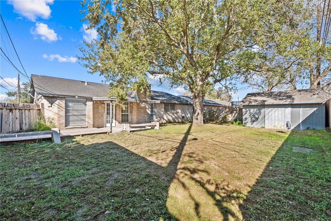 1910 Cherokee Street Corpus Christi, TX 78409 - Photo 18 of 23 a view of a house with a yard and sitting area