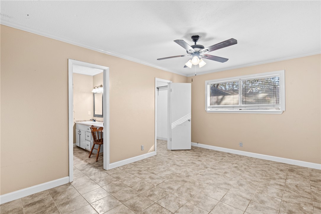 1910 Cherokee Street Corpus Christi, TX 78409 - Photo 9 of 23 a view of an empty room with a window