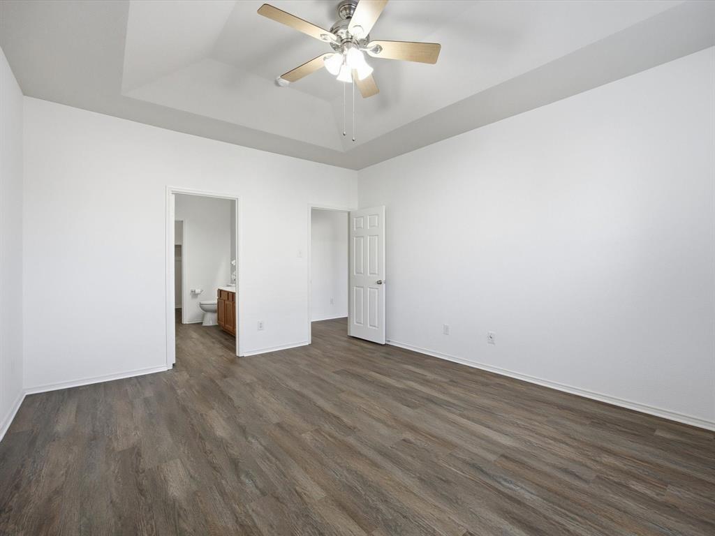 13264 Fencerow Road Fort Worth, TX 76244 - Photo 15 of 26 wooden floor in an empty room
