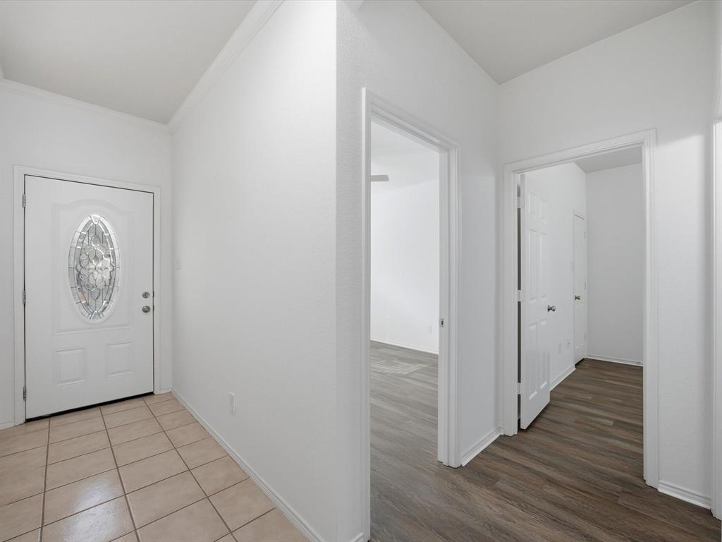13264 Fencerow Road Fort Worth, TX 76244 - Photo 3 of 26 a view of hallway with wooden floor