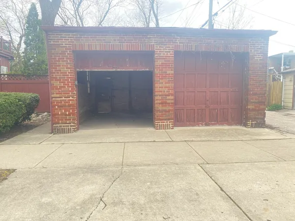 a front view of a house with a garage