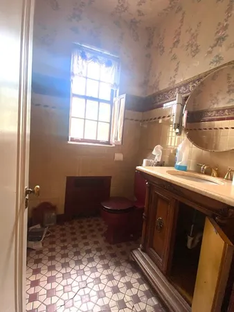 a bathroom with a sink and a toilet
