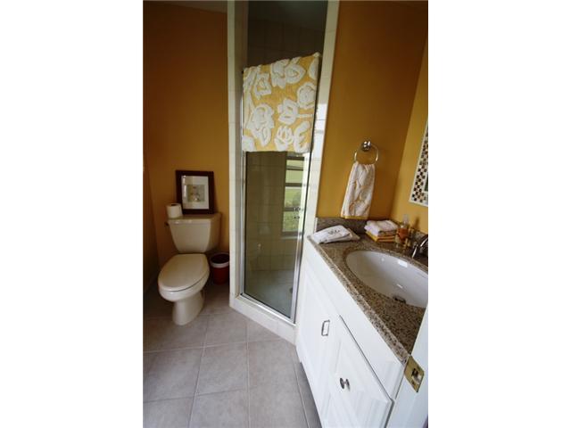 3333 Southeast Fairway East Stuart, FL 34997 - Photo 10 of 14 a bathroom with a sink and toilet