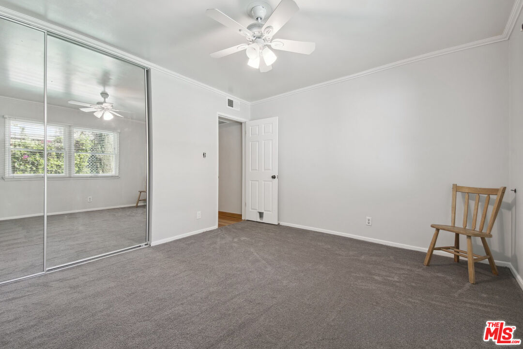 5527 Columbus Avenue Sherman Oaks, CA 91411 - Photo 17 of 29 a view of an empty room with a window