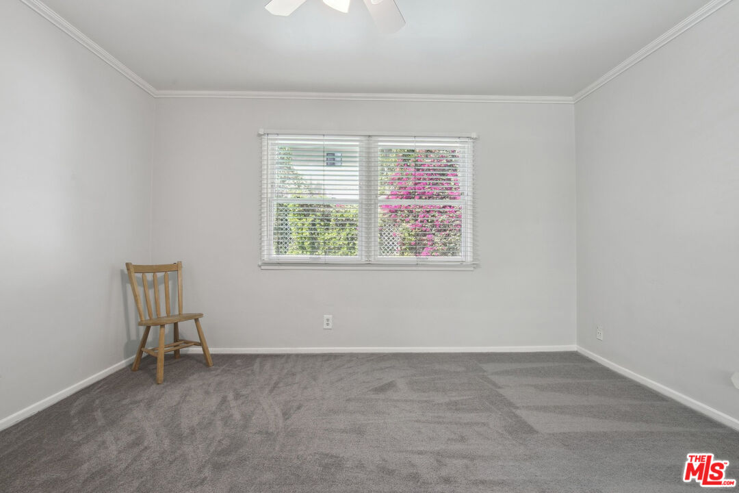 5527 Columbus Avenue Sherman Oaks, CA 91411 - Photo 18 of 29 an empty room with a window