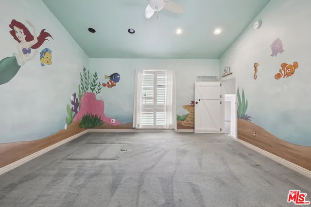 a bathroom with a toilet a sink and shower