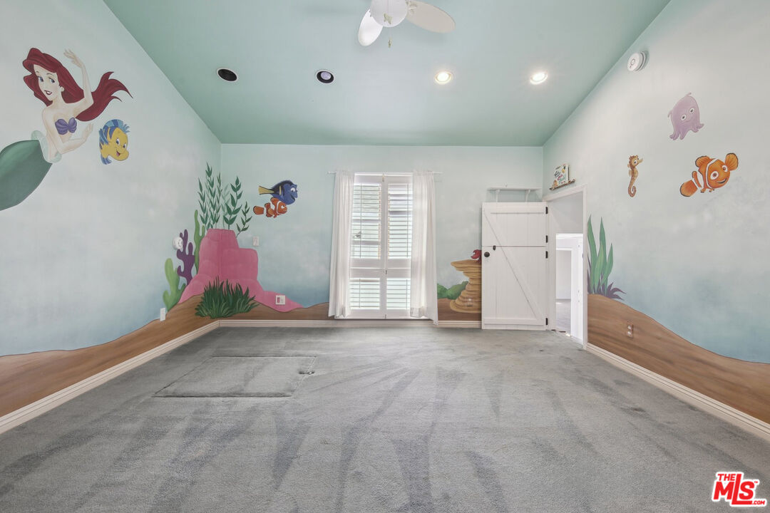 5527 Columbus Avenue Sherman Oaks, CA 91411 - Photo 23 of 29 a view of livingroom with hallway and toys