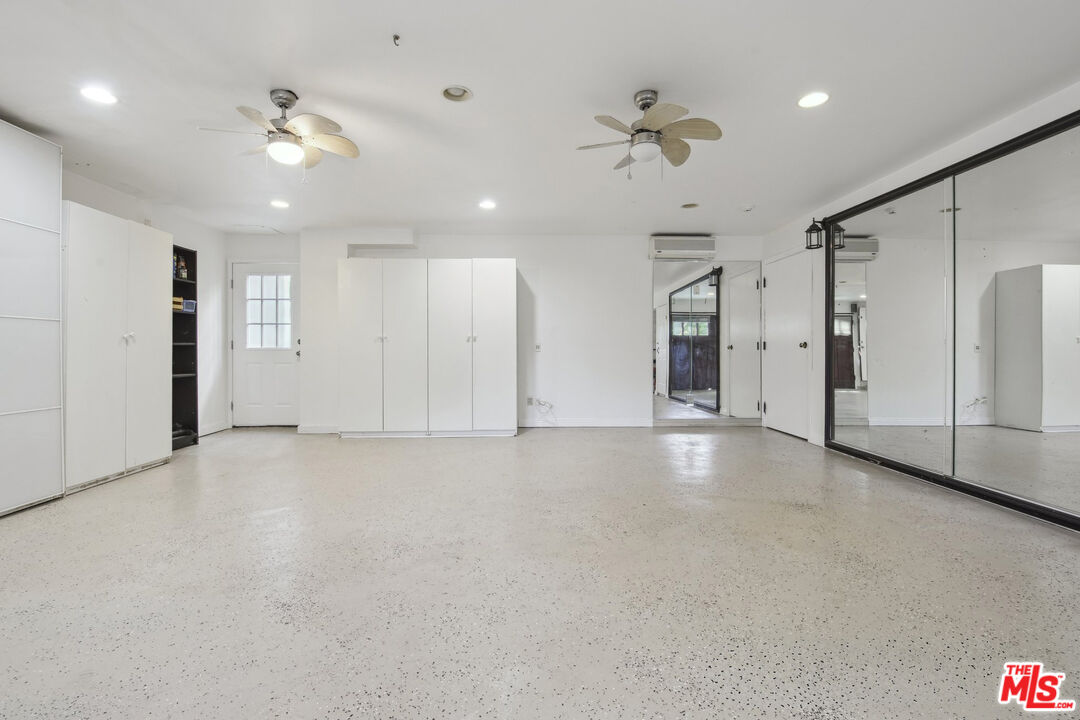 5527 Columbus Avenue Sherman Oaks, CA 91411 - Photo 27 of 29 a view of an empty room with a ceiling fan