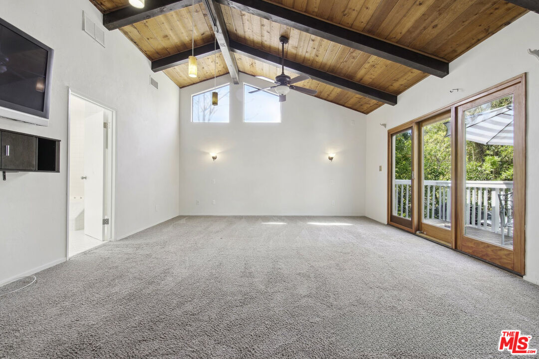 5527 Columbus Avenue Sherman Oaks, CA 91411 - Photo 9 of 29 a view of an empty room with a window