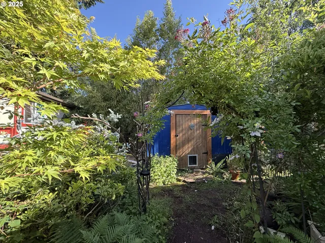 a view of a backyard of a house