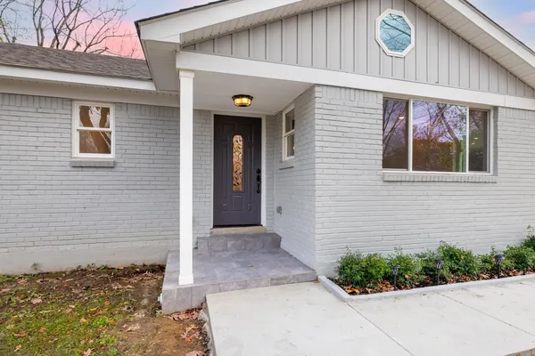 a front view of a house with entryway