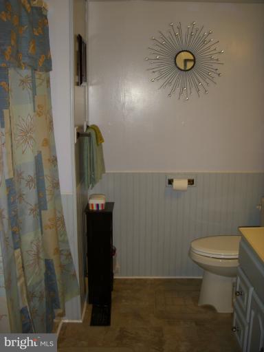 339 Sassafras Road Baltimore, MD 21221 - Photo 7 of 20 a bathroom with a sink and a toilet