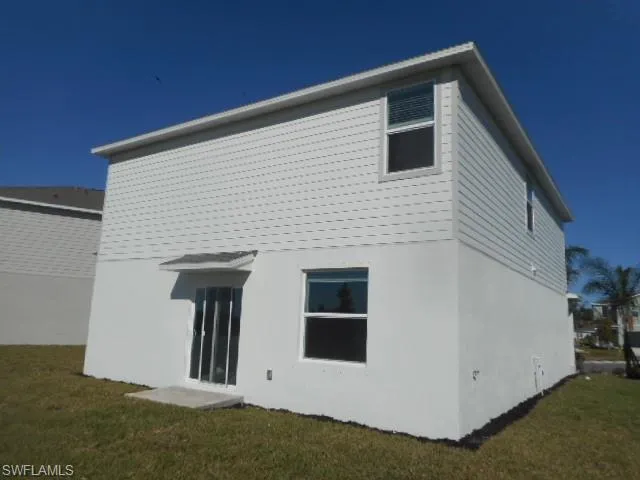 a view of backyard of house