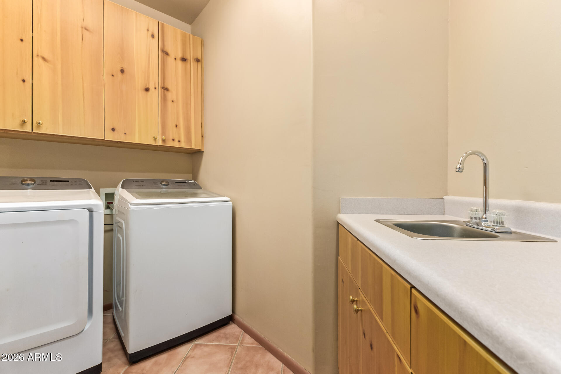 15137 South Moon Valley Road Arizona City, AZ 85123 - Photo 28 of 35 a utility room with dryer and washer