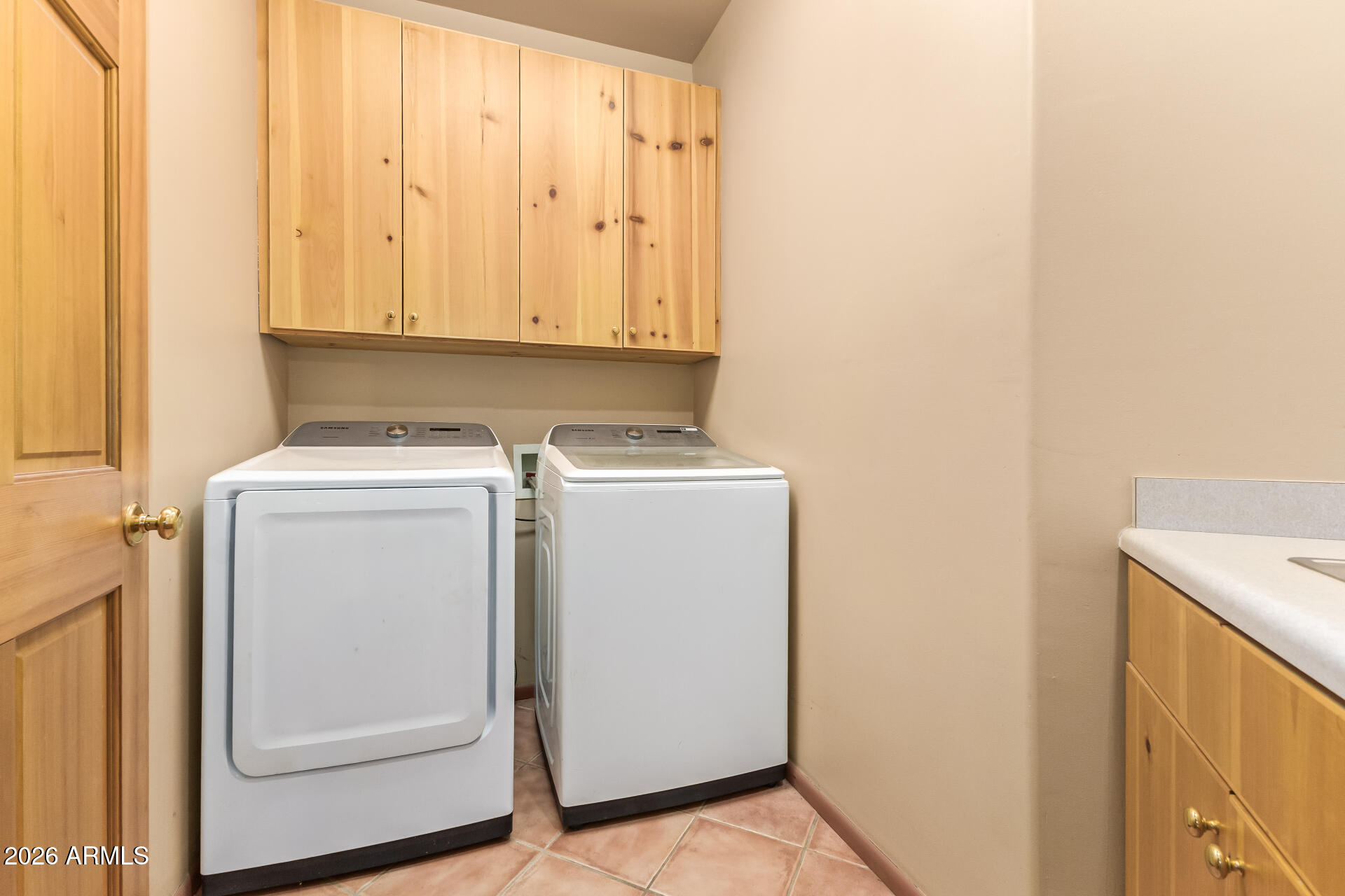 15137 South Moon Valley Road Arizona City, AZ 85123 - Photo 29 of 35 a utility room with dryer and washer