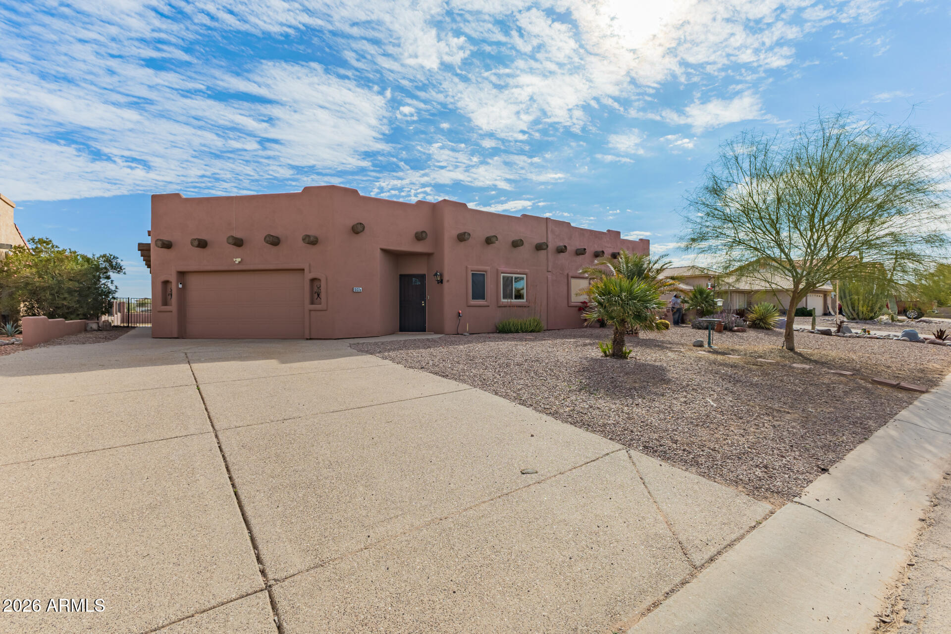 15137 South Moon Valley Road Arizona City, AZ 85123 - Photo 3 of 35 a view of a road with a building in the background