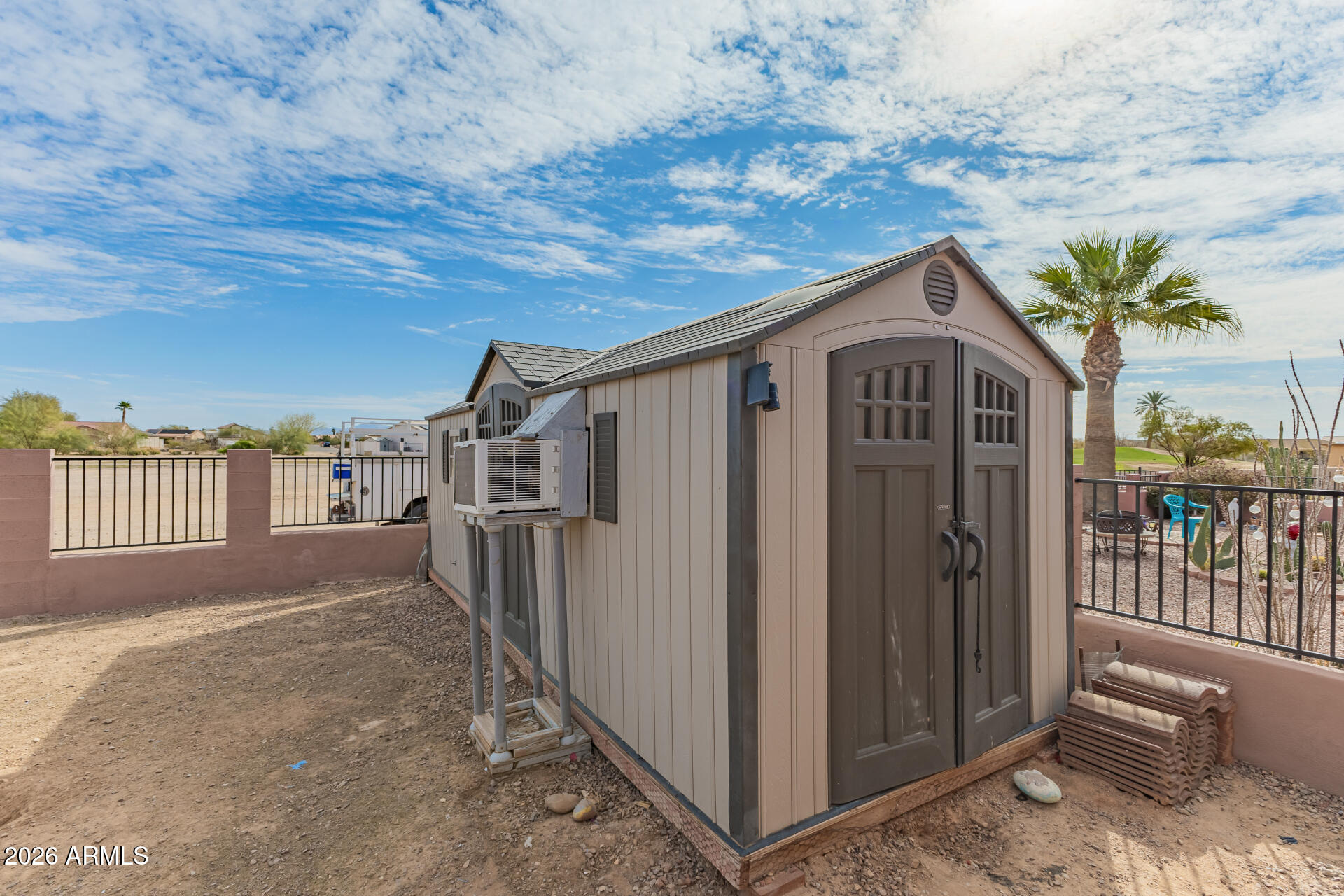 15137 South Moon Valley Road Arizona City, AZ 85123 - Photo 33 of 35 a view of a house with a yard