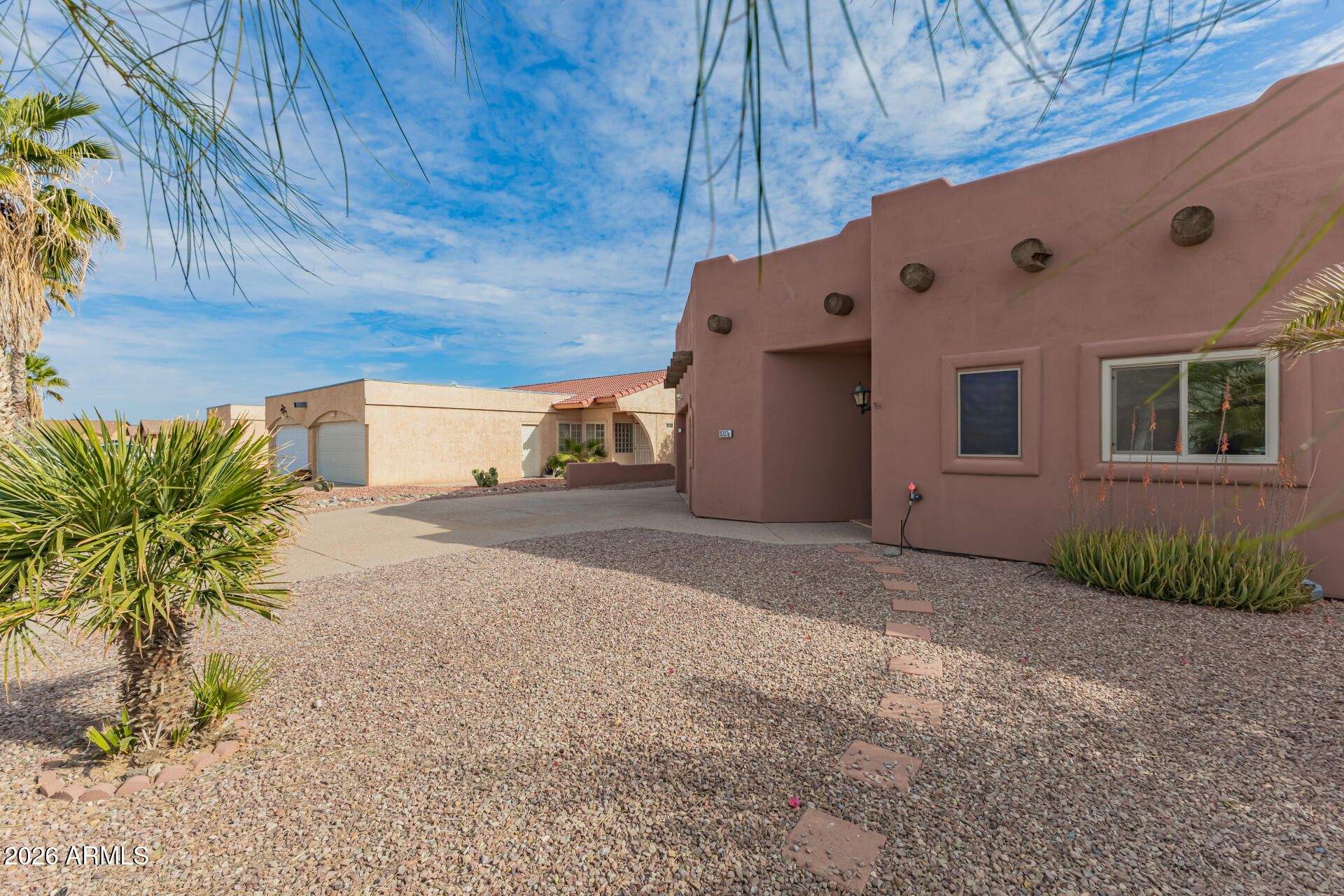 15137 South Moon Valley Road Arizona City, AZ 85123 - Photo 5 of 35 a view of a house with a yard