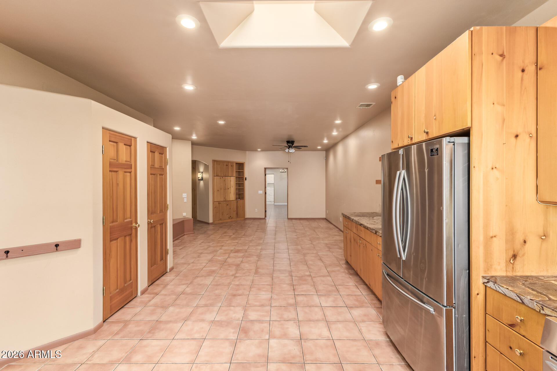 15137 South Moon Valley Road Arizona City, AZ 85123 - Photo 10 of 35 a view of a hallway with a refrigerator
