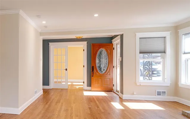 a view of entryway with wooden floor
