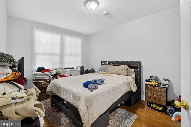 a bed room with a bed and a couch