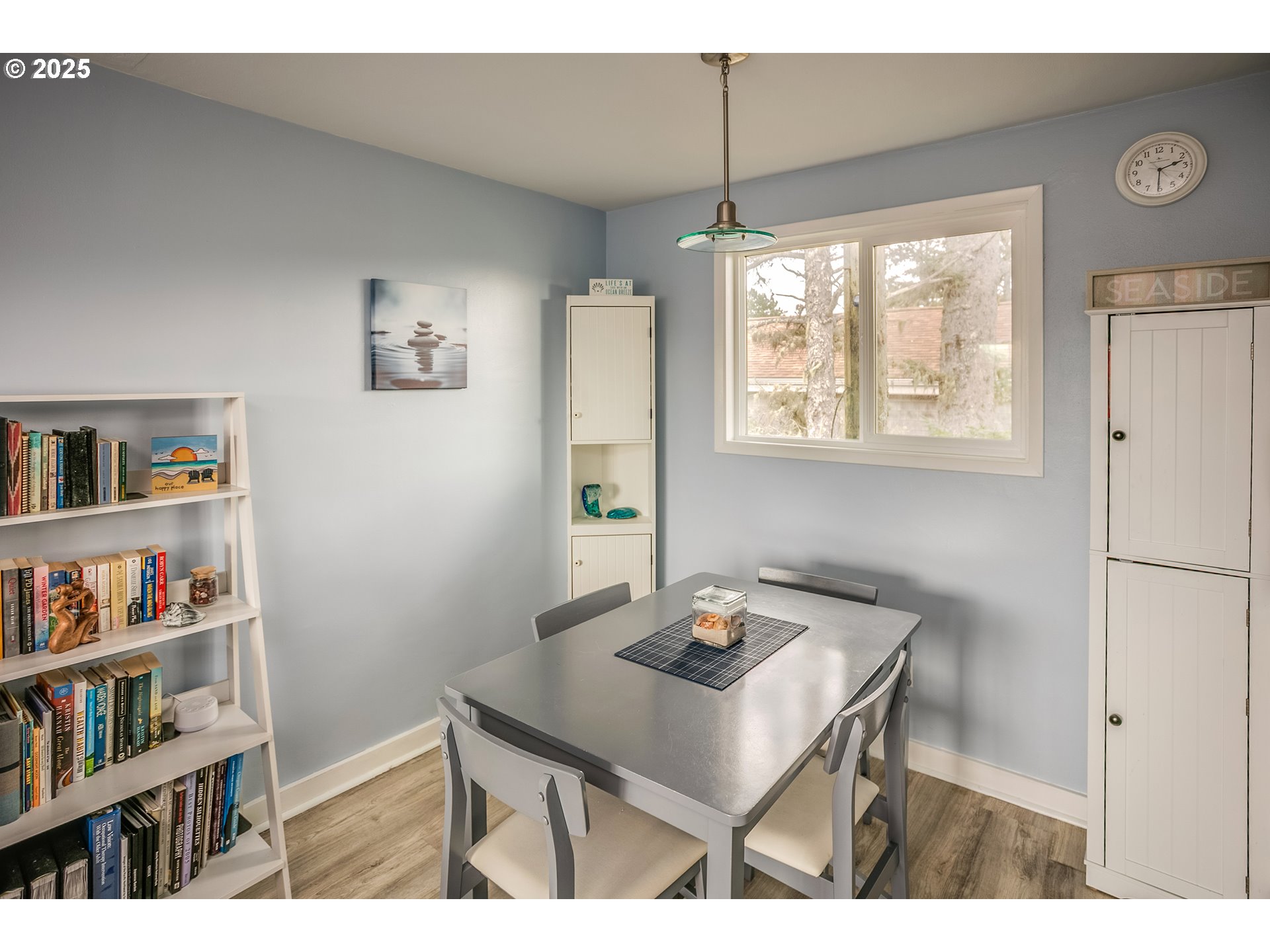 2233 Beach Drive, Unit 40 Seaside, OR 97138 - Photo 10 of 18 a view of a workspace with furniture and a window