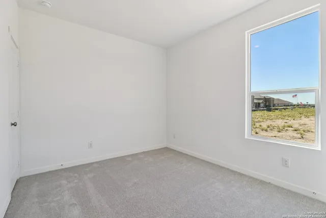 an empty room with a door