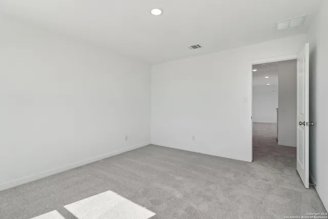 a white bath tub sitting next to a white sink