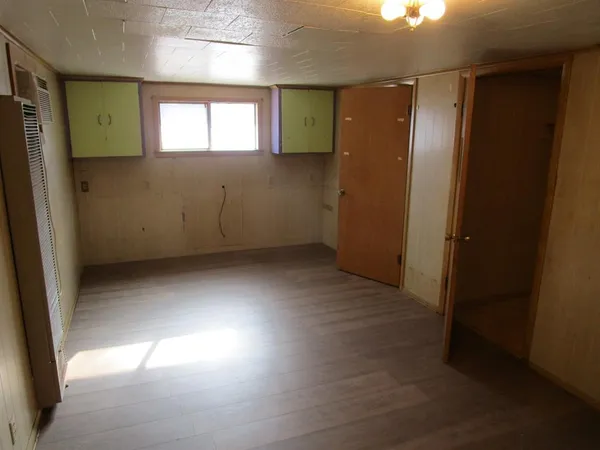 a view of hallway with closet