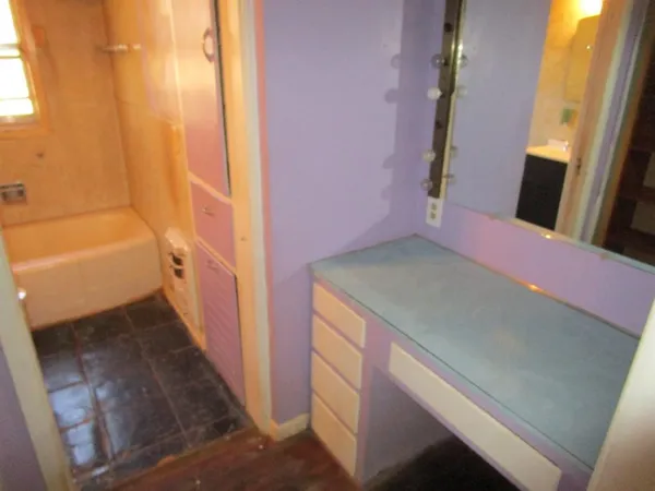 a bathroom with a sink and a bathtub