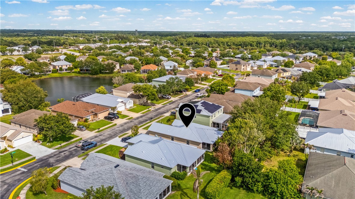 131 Bellamy Trail Sebastian, FL 32958 - Photo 27 of 32 an aerial view of residential houses with outdoor space and swimming pool