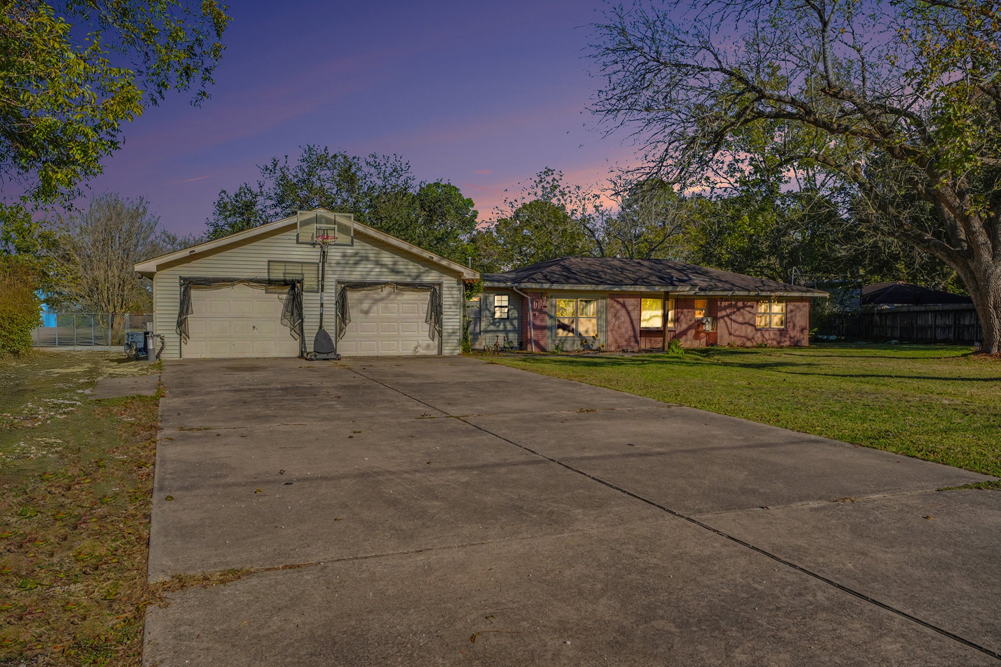 4802 Crosby Cedar Bayou Road Baytown, TX 77521 - Photo 1 of 28 a front view of a house with a yard