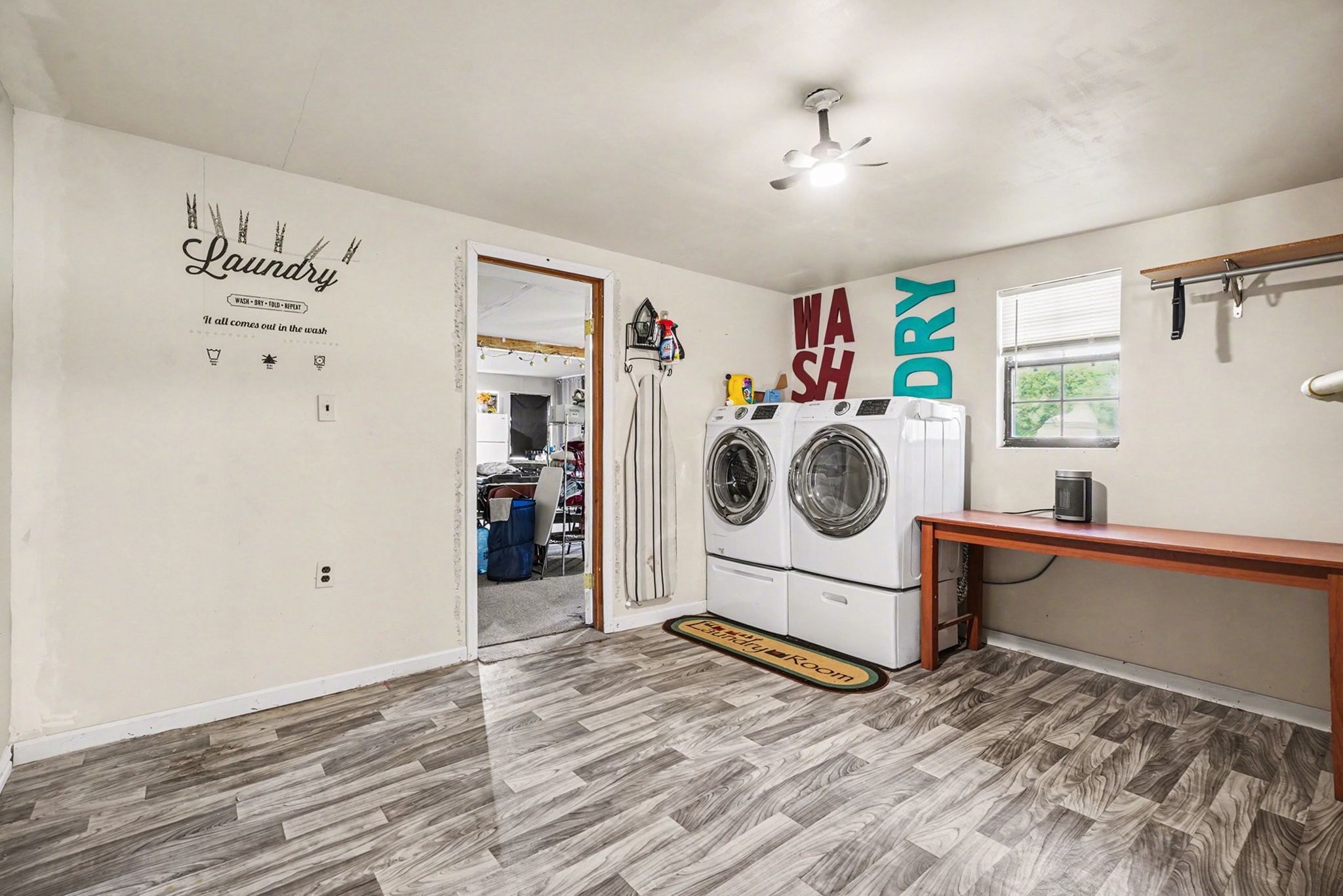 4802 Crosby Cedar Bayou Road Baytown, TX 77521 - Photo 18 of 28 a view of a bedroom with baby bed and workspace