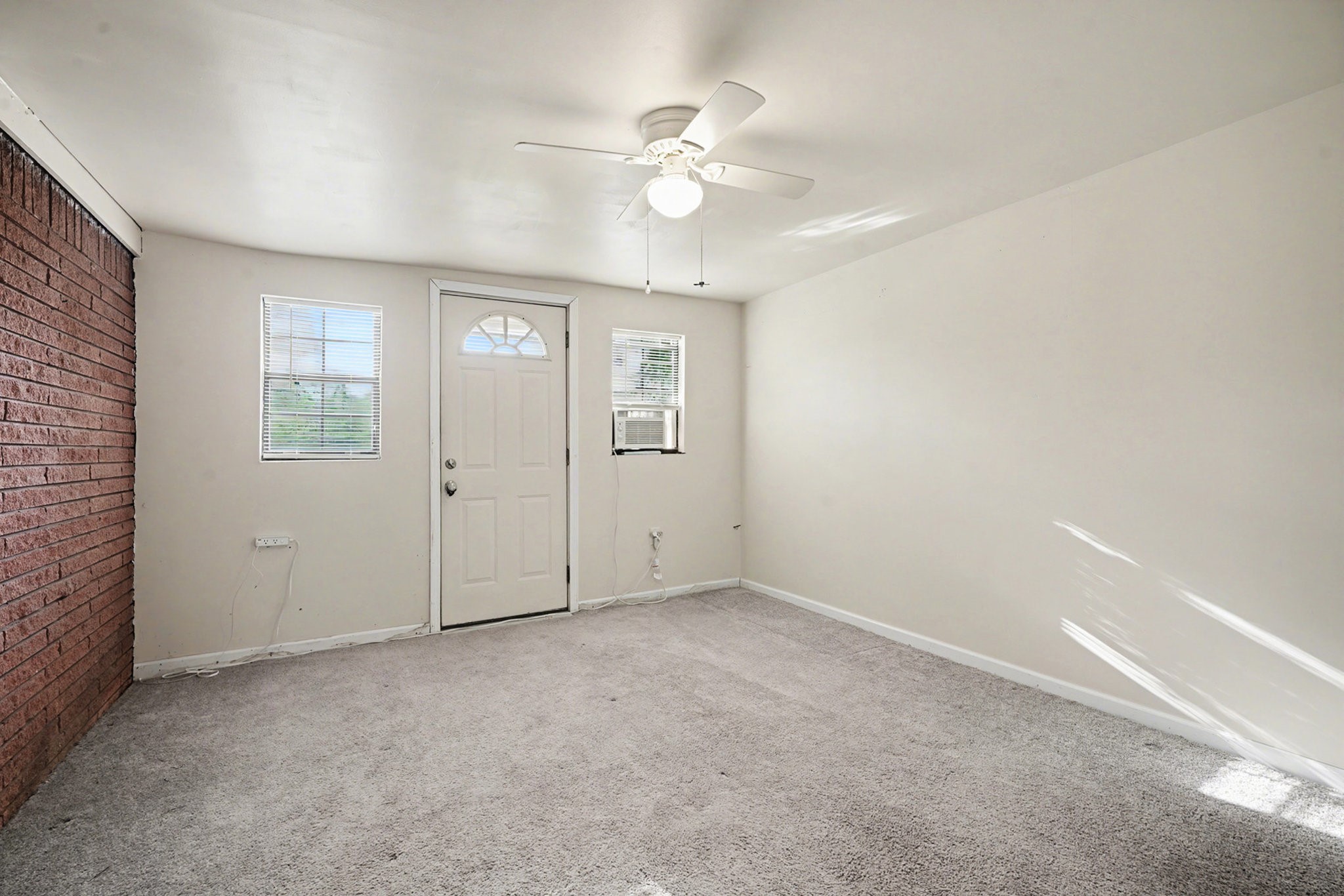 4802 Crosby Cedar Bayou Road Baytown, TX 77521 - Photo 19 of 28 a view of an empty room with a window